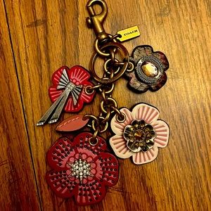 Coach new without tags leather flowers charms with metal rinestone accents